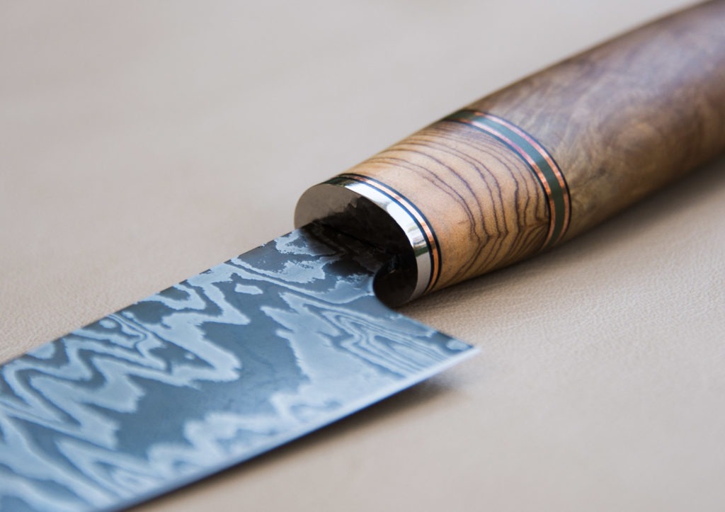 Damascus steel knives, such as this one by Phil Astley, are both beautiful and functional