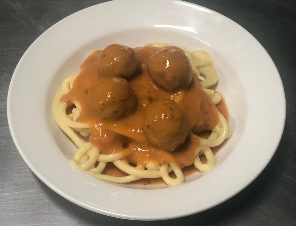 Textured Concept Foods remoulded spaghetti with meatballs.