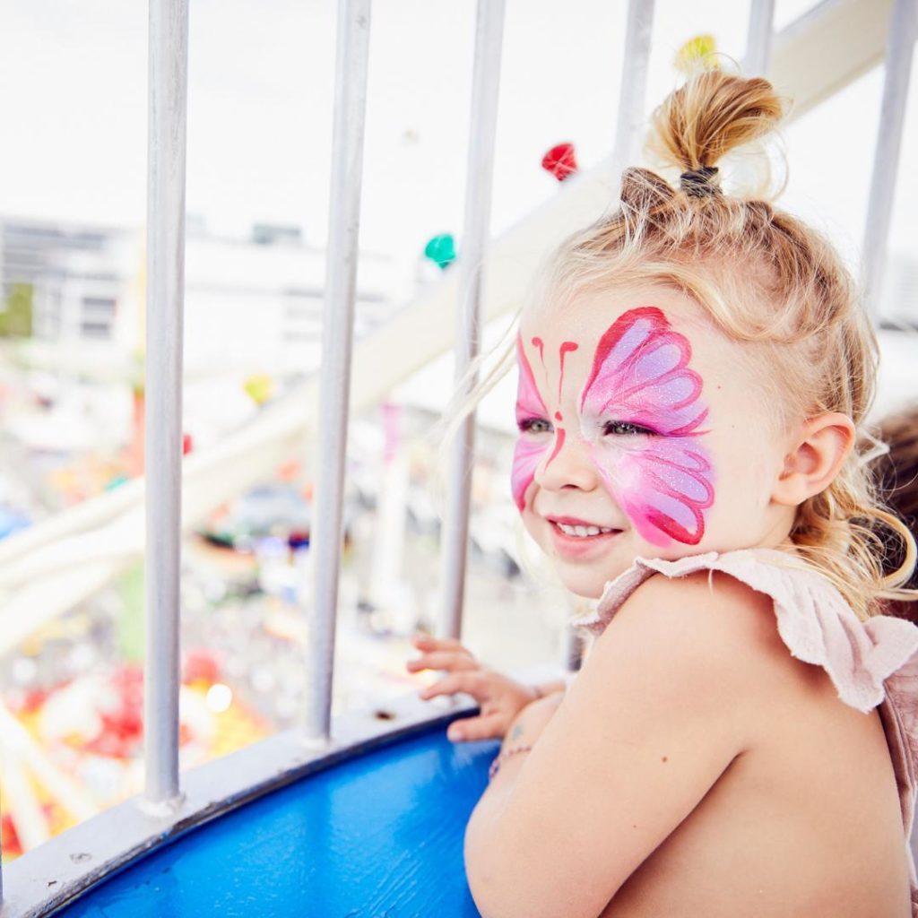 Rides and face paint equals happy little show-goers